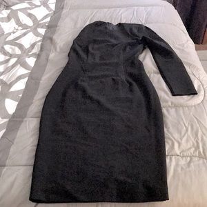 A beautiful fitted black dress for a date night or elegant wear.